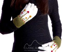 Black sweater with white and green gloves