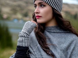Woman in knit hat and gloves outdoors