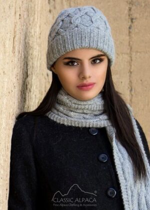 Woman in gray knit hat and scarf