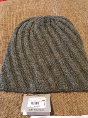 Gray knitted beanie on display