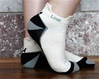 Close-up of feet in sports socks