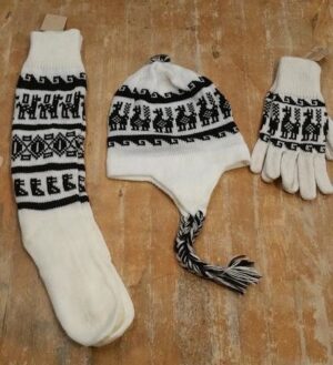 Cozy knit set on wooden surface