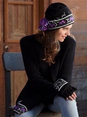 Woman wearing knitted hat and gloves