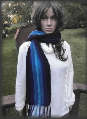 Dark-haired mannequin in garden setting