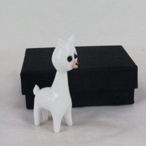 Small white sculpture with black box