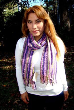 Person with long hair, purple scarf
