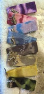 Various tie-dye socks arranged vertically