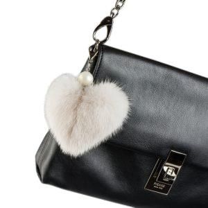 Stylish bag featuring fur heart accessory