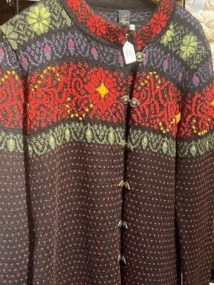 Traditional patterned cardigan with red, green, yellow accents