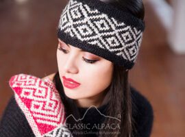 Young woman wearing a patterned winter hat and scarf.