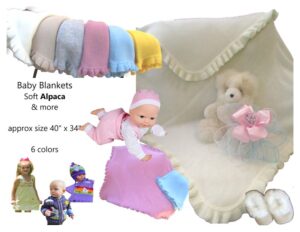 Soft baby blankets in pastel colors, featuring a doll and teddy bear.