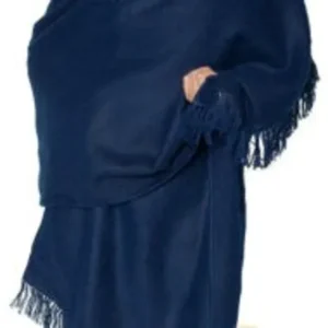 Woman wearing a navy blue dress with fringe details.