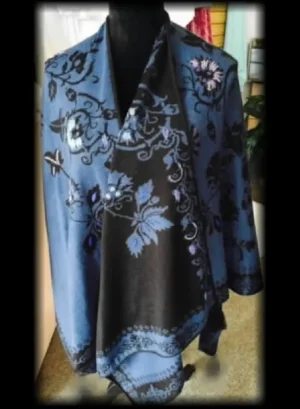 A stylish dark blue dress with floral embroidery.