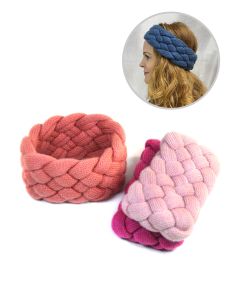 Two chunky knit headbands in pink and peach with a braided design.