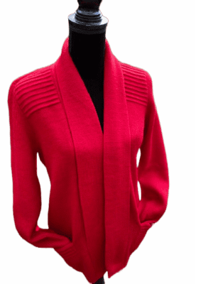 Bright red open-front cardigan with textured shoulder detail on a black mannequin.