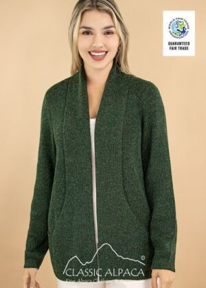 Woman wearing a green zip-up cardigan with pockets.